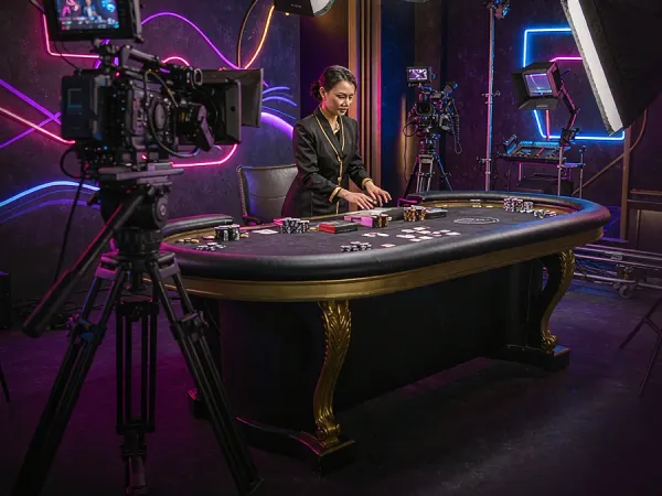 k1game + Camera and studio lighting facing a casino table