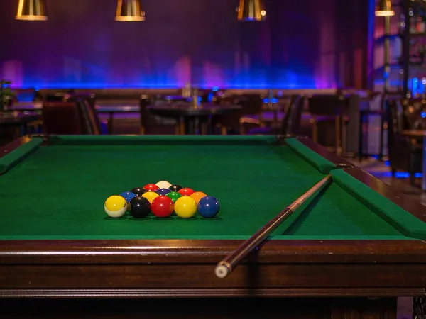 k1game + Billiard balls on a green pool table